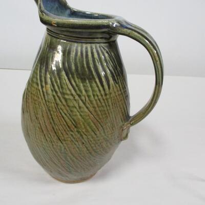 Pottery Pitcher Stamped