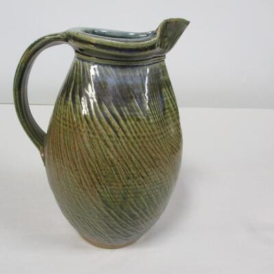Pottery Pitcher Stamped
