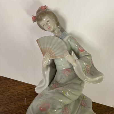 Two Japanese Porcelain Figurines