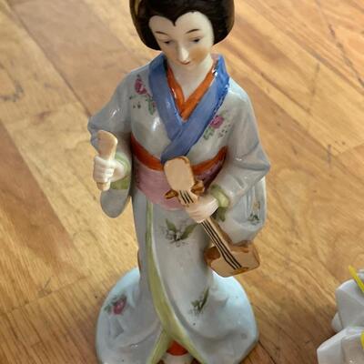 Two Japanese Figurines