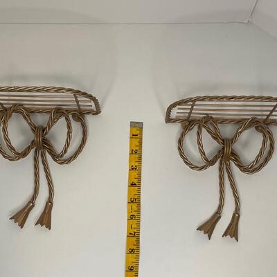 Gold metal tied bows small shelfs