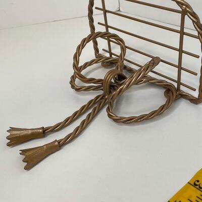 Gold metal tied bows small shelfs