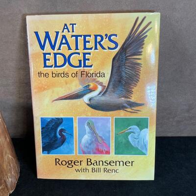 Lot 27  Blue Heron Figure and Book