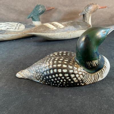 Lot 34. Two Duck Decoys and Loon Figurine