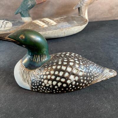 Lot 34. Two Duck Decoys and Loon Figurine