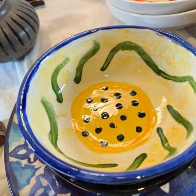 Moroccan theme tableware, dramatic grey slag glass floral display