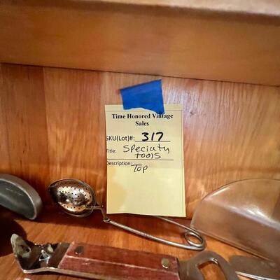 Top shelf specialty measuring and kitchen stainless tools