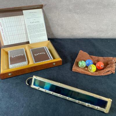 Lot 90  Marbles, Canasta Set and Kaleidoscope