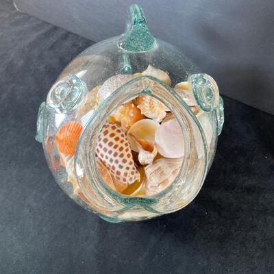 Lot 113. Fish Bottle and Jar with Shells