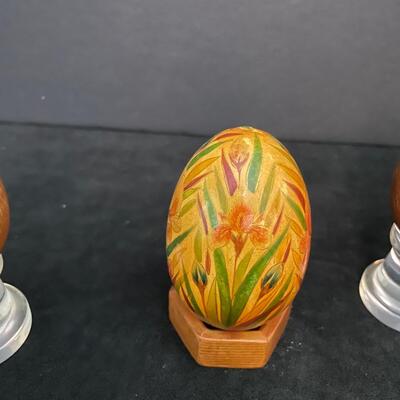Lot 159. Three Vintage Wooden Eggs on Stands