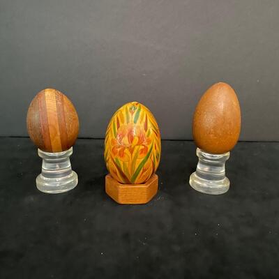 Lot 159. Three Vintage Wooden Eggs on Stands