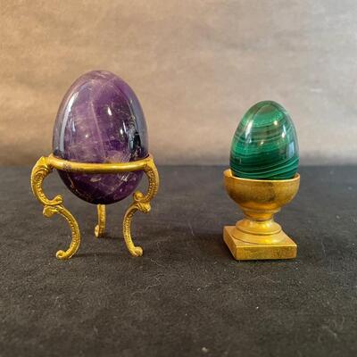 Lot 165  Two Stone eggs on stands