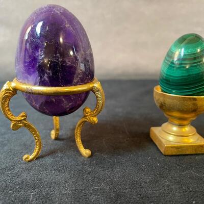 Lot 165  Two Stone eggs on stands
