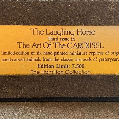 Lot 169  Two Carousel Horses