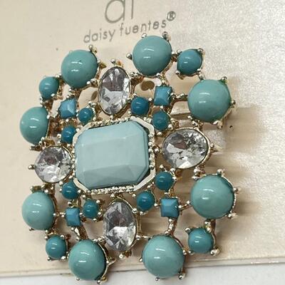 LOT 39: Five Pins/Brooches - One with Loose Stones