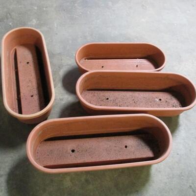 Plastic Planters  (with channels in the bottom that allows them to fit over a porch railing)