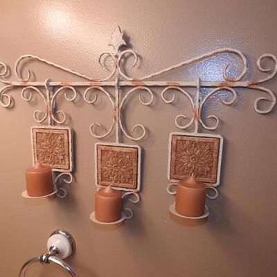 Hanging metal candleholders