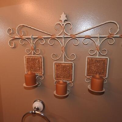 Hanging metal candleholders