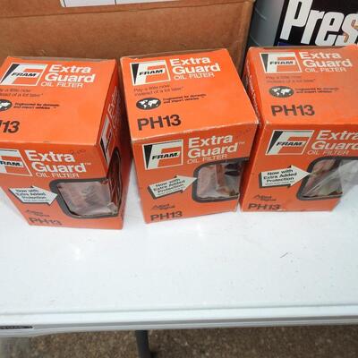 Box lot of oil plus more