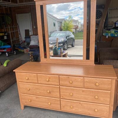 G24 Dresser and mirror, is 30 1/4 inches tall, 59 1/2 inches wide, 18 inches deep. Mirror is 42 inches tall 37 1/2 inches wide