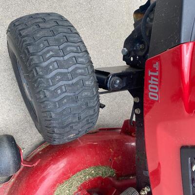 G43 Craftsman T1400 riding lawn mower with plow attachment and tire chains. Starts right up!!