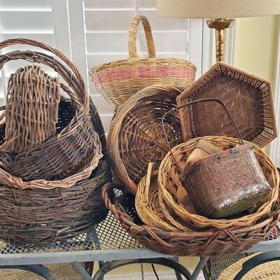 Many, many vintage and antique baskets