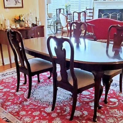 Dining Table and 4 chairs $350. Table has 1 leaf. With leaf 79" x 44 1/2", with out leaf, 65"