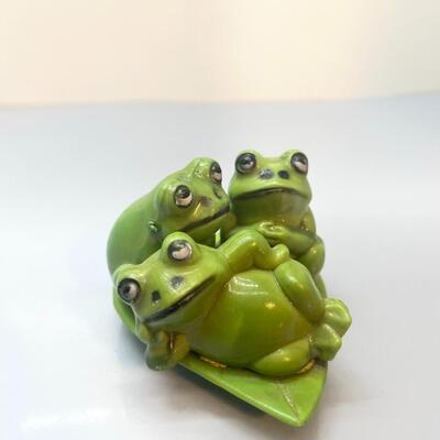 Adorable photogenic porcelain frogs
