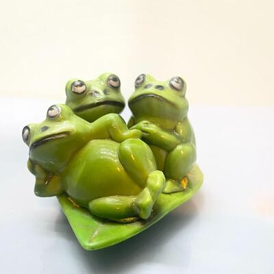 Adorable photogenic porcelain frogs