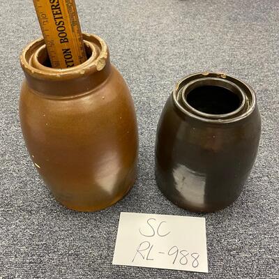 2 jugs-slight damage at the top as pictured