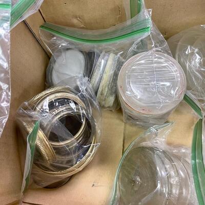 Assortment of canning jars accessories