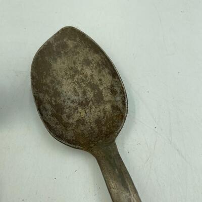 Serving spoons and brass tongs