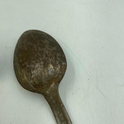 Serving spoons and brass tongs