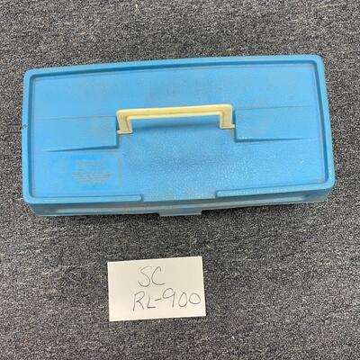 Plastic storage box with metal containers and state park memorabilia