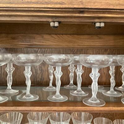 Set of 13 wine glasses with women's figure stem
