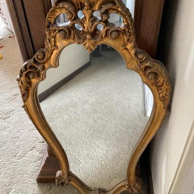 Mirror with gold wood frame