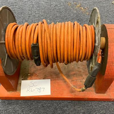 Electrical cord on wooden spool