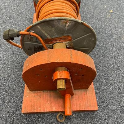 Electrical cord on wooden spool