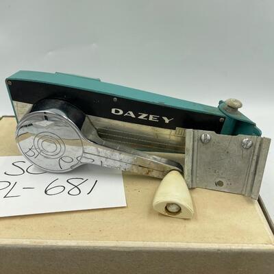 Daley D can opener w/ wall mount