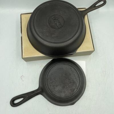 2 small cast iron skillits