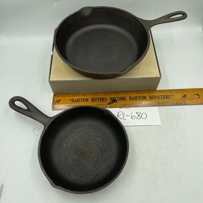 2 small cast iron skillits