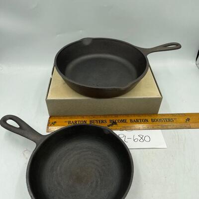 2 small cast iron skillits
