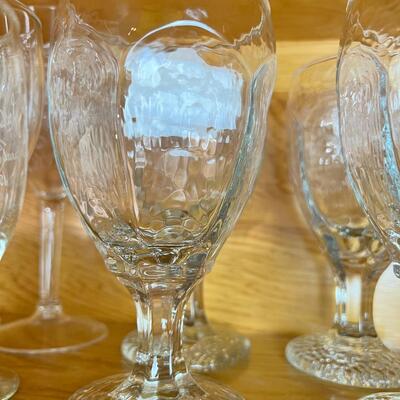 Shleves full of Drinking and wine glasses