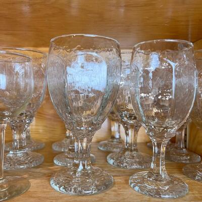 Shleves full of Drinking and wine glasses