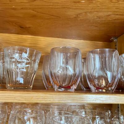 Shleves full of Drinking and wine glasses