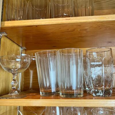 Shleves full of Drinking and wine glasses