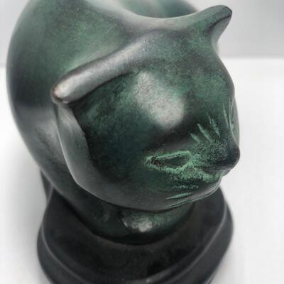 Green cat figurine