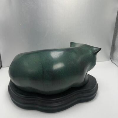Green cat figurine