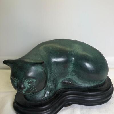 Green cat figurine