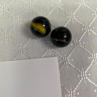 Black, orange and yellow
Black yellow
